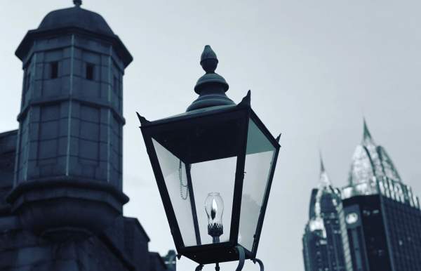 Street lantern in front of the turret at Colonial Fort Conde and the RSA tower