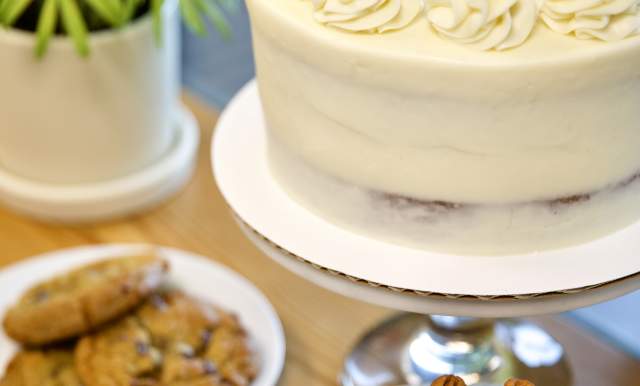 cake, three cookies on a plate, chocolate bundt cake with pecans on top