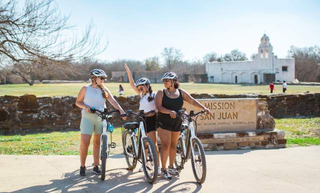 3 Friends with Bikes in front of Mission San Jose