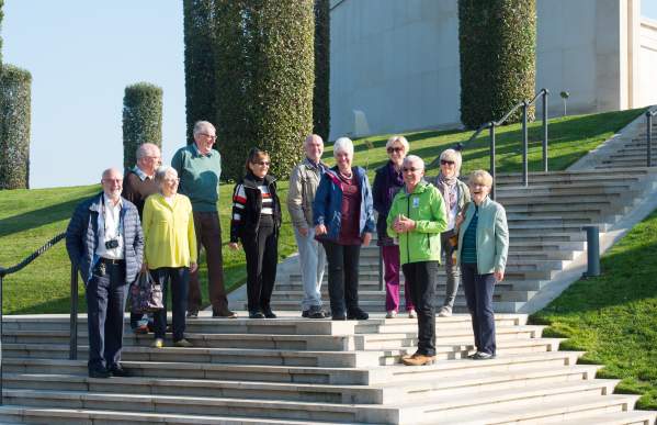 National Memorial Arboretum group talk on steps Armed Forces Memorial