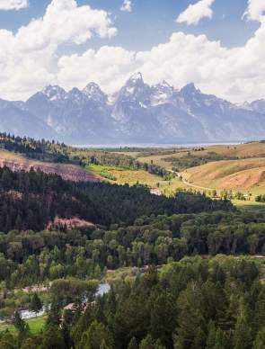 Scenic view of Grand Teton National Park with towering peaks and lush forests in Sublette County, Wyoming.