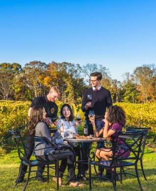 Women wine tasting at a vineyard