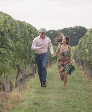 couple running-through-winery