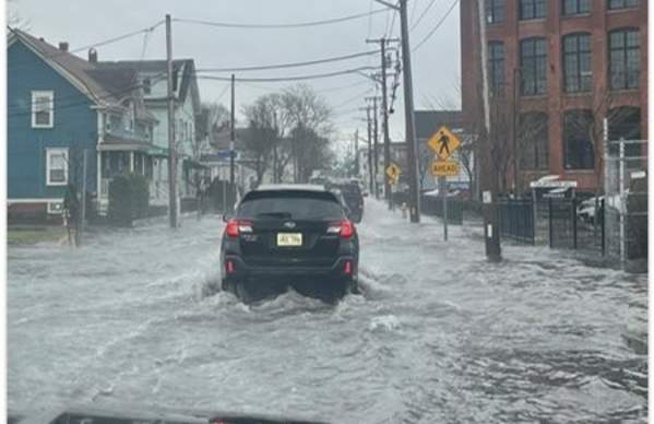 Flooded street with cars
