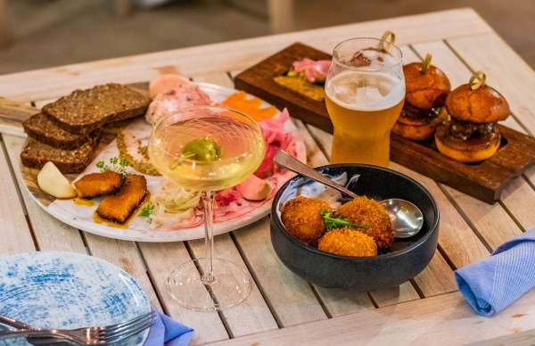 table with a variety of food an drink