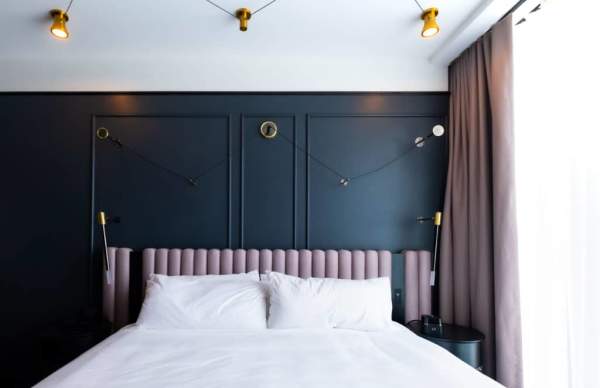 hotel room with queen sized bed