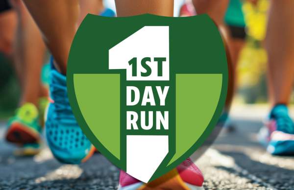 a photo of a group of runners from the shin down with a logo overlayed that reads "1st Day Run"