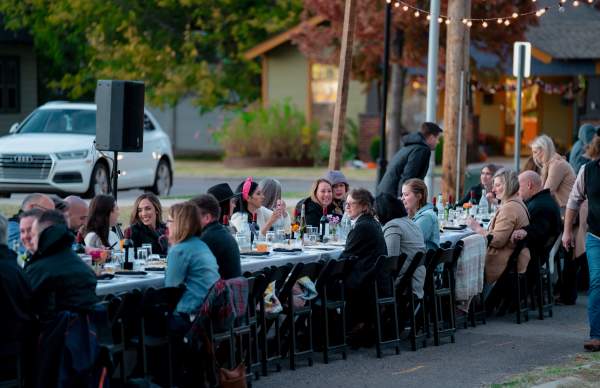 A large group eating outdoors