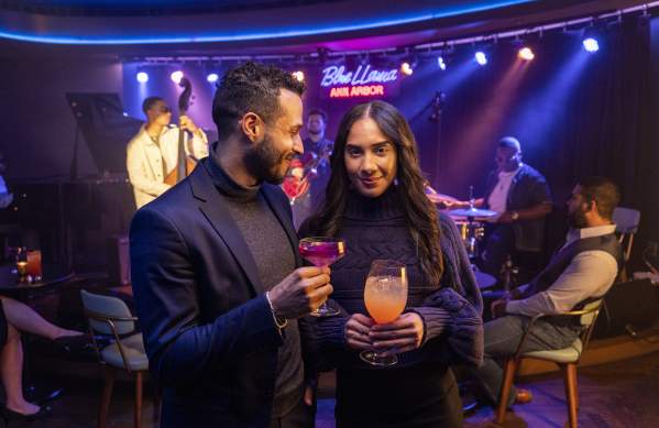 Couple with cocktails at Blue Llama Jazz Club
