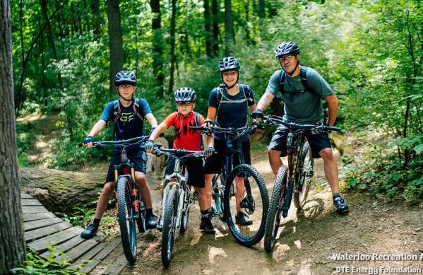 Family biking the DTE Energy Foundation Trail