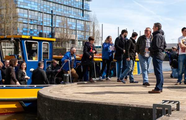 A group of people disembarking a Bristol Ferry Boat at the Temple Quay landing on a Bristol Brewery Tour - credit Bristol Ferry Boats