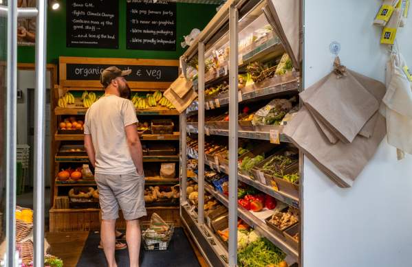 A man browsing the store at Better Food, Wapping Wharf on Bristol's Harbourside - credit Hey What