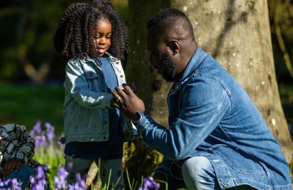 A father and daughter exploring the grounds at Westonbirt Arboretum near Bristol - credit Johnny Hathaway