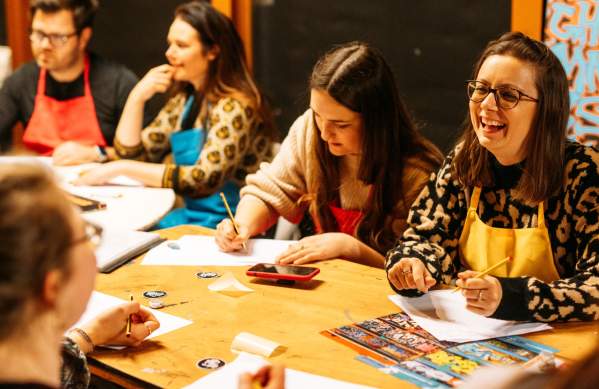 A group of people taking part in one of the street art workshops at Graft Bristol - credit Yuup