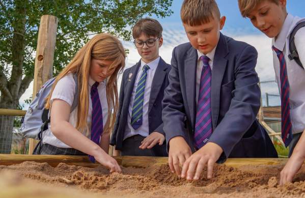 Noah's Ark Zoo Farm Accessibility - Children with hands in sand