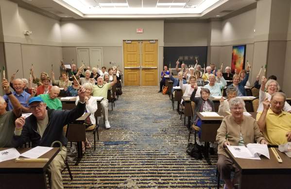 Group of people taking an Irish Penny Whistle class