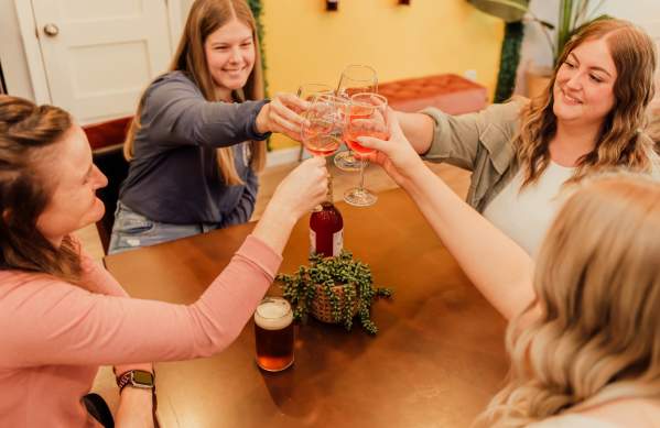 Friends drinking wine at WaterTower Winery