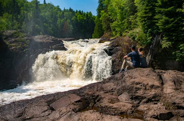 Couple by waterfall