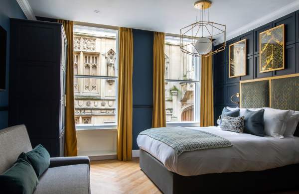 A bedroom with Guildhall view at Hort's Townhouse in Bristol - credit Youngs