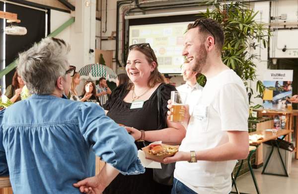 People talking at food and drink event - credit Charlotte Tolhurst