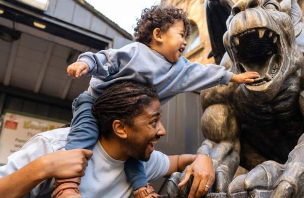 A father and son at Wookey Hole in Wells, near Bristol - credit Wookey Hole