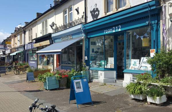 Shop fronts on the Pigsty Hill section of Gloucester Road in North Bristol