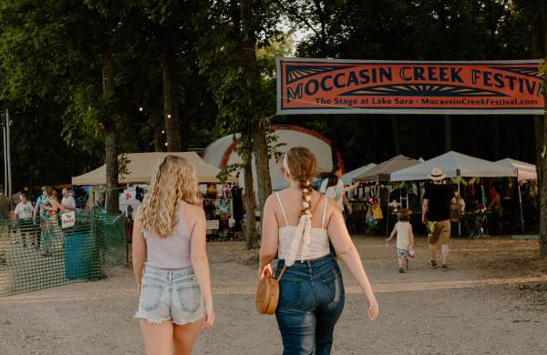 Girls walking into Moccasin Creek Festival