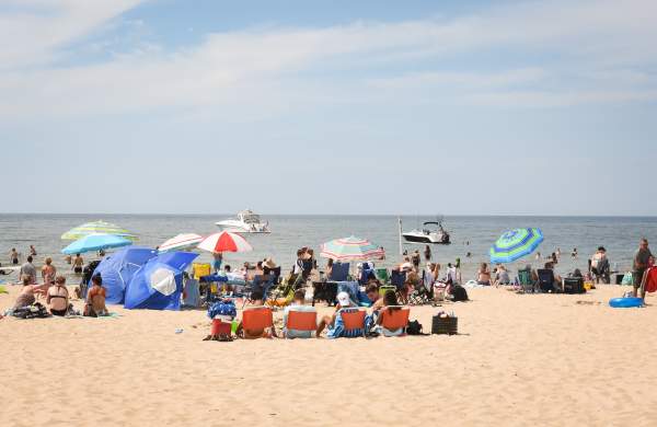 People at Holland State Park Beach