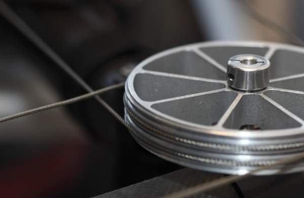 A steel pulley on a blurred background