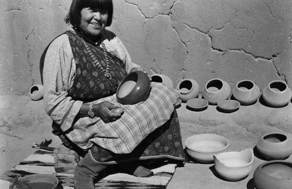 Maria Martinez polishing pottery, San Ildefonso Pueblo, New Mexico