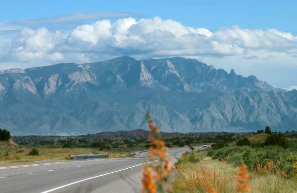 Get a guided tour of New Mexico. Sandia Peak off in the distance.
