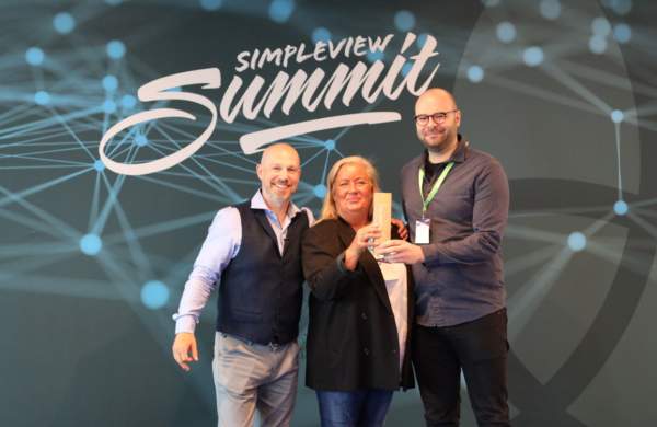 Visit Oslo's Bernhard Probst Receives a 30 Year Client Award from Simpleview's Norway Country Manager Trine Avnung and MD Richard Veal
