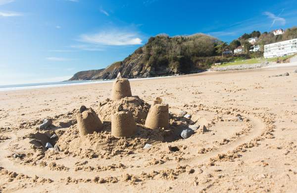A sandcastle built on Caswell Bay Beach