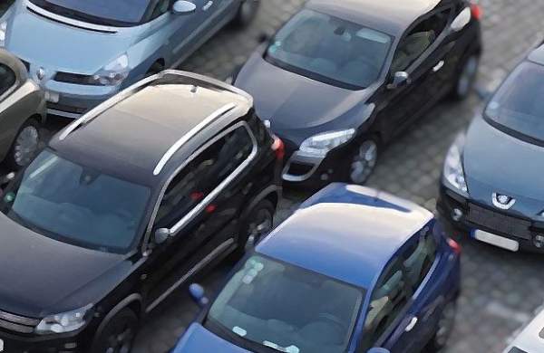 photos of cars in a car park