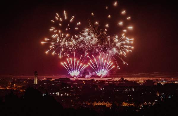 Fireworks over Swansea bay with the city in the foreground
