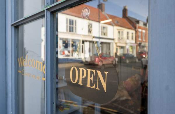 An 'open' sign in a shop window in Spilsby