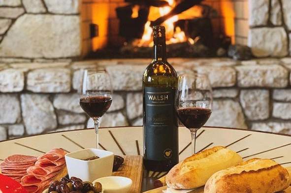 Walsh Family Wine display with platter and bread