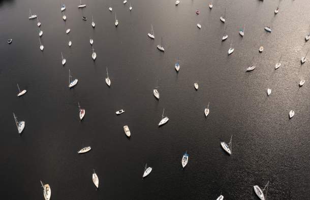 sailboats gathering in Lake Champlain