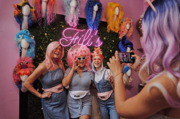 Trying on Wigs at Fifi Mahony’s in New Orleans