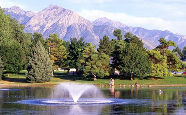 Lake at Liberty Park with view of mountains