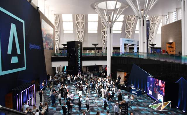 Photo of a large open area at the Salt Palace Convention Center from the top of the grand staircase looking toward the exhibit halls