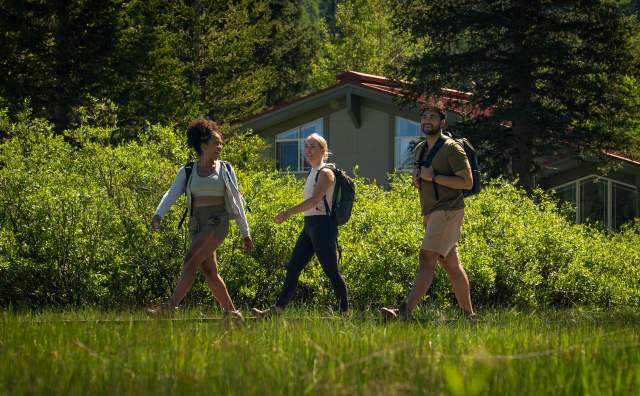 Three friends hiking in Brighton, Utah