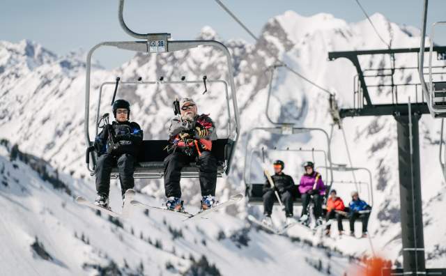 Skiers on the ski lift