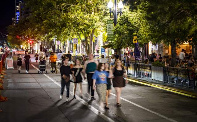 A group walking down Main Street during 2022’s Open Streets.