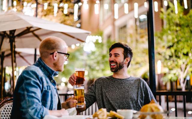 Friends Hanging Out Having A Beer