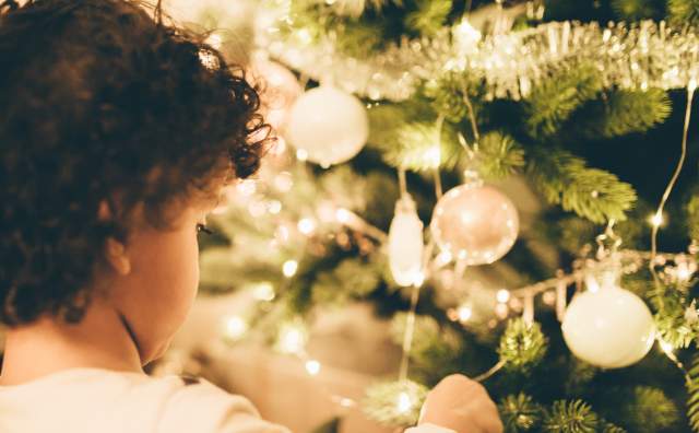 Child Looking at Christmas Tree