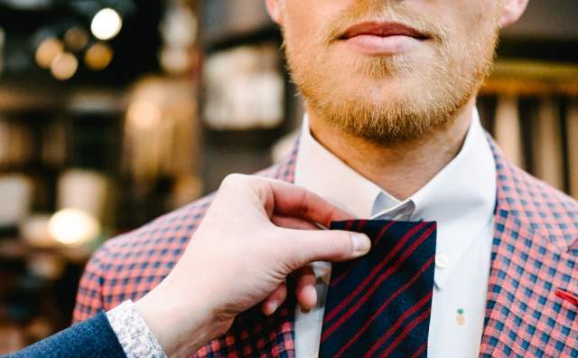 Man Trying on Tie City Creek Center