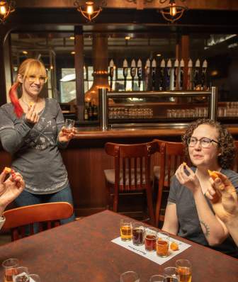A group samples a beer flights at Capital Brewery