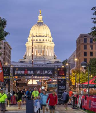 Ironman Village with the Capitol Building lit up behind it