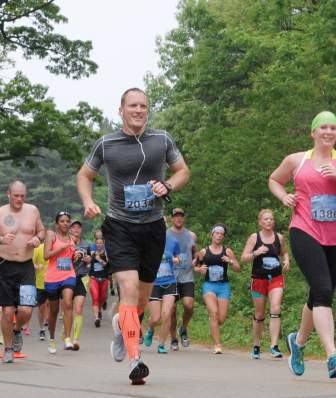 A group of runners compete in a Spring race